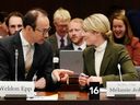 Foreign Affairs Minister Melanie Joly speaks with senior Global Affairs Canada official, Weldon Epp before appearing at committee, Wednesday, March 22, 2023 in Ottawa. In January, Global Affairs Canada was attacked, leading to a data breach that limited remote access to its networks.