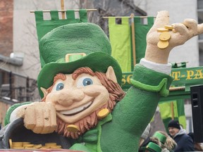 Many will don their green outfits with clover-green hats and head out to celebrate St. Patrick's Day across Canada -- but not all will indulge in alcohol. A giant leprechaun is shown during the St. Patrick's Day parade in Montreal, Sunday, March 19, 2023.