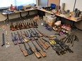 A 56-year-old man from Hudson Bay is facing a slew of charges after a cache of weapons and ammunition was found in the Viellardville area. Police said they found 40 rifles, two handguns, about 20 more firearms in various states of disassembly as well as more than 10,000 rounds of ammunition, powder and rifle casings used to reload shells, and boxes of prohibited high capacity rifle magazines.
