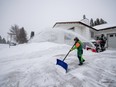 People snow shovelling