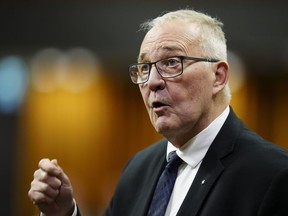 National Defence Minister Bill Blair rises during question period in the House of Commons on Parliament Hill in Ottawa on March 18, 2024.