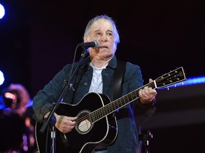FILE - Paul Simon performs at Global Citizen Live in Central Park in New York on Sept. 25, 2021. Simon's latest honor places him among public figures well outside the music industry. He is this year's winner of PEN America's PEN/Audible Literary Service Award, Thursday, March 7, 2024, which previously has been given to former President Barack Obama, the late Nobel laureate Toni Morrison and Stephen King among others.