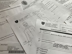 Some of the documents obtained during the Lethal Restraint investigation by The Associated Press in collaboration with the Howard Centers for Investigative Journalism and FRONTLINE (PBS) are photographed in New York on Wednesday, March 27, 2024. After George Floyd was killed under a Minneapolis police officer's knee, reporters at The Associated Press wanted to know how many other people died following encounters in which law enforcement used not firearms but other kinds of force that is not supposed to be fatal.