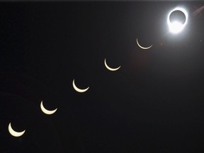FILE - The progression of a total solar eclipse is seen in a multiple exposure photograph taken in 5-minute intervals, with the moon passing in front of the sun above Siem Reap in northwestern Cambodia, 225 kilometers (140 miles) from Phnom Penh, on Tuesday, Oct. 24, 1995.