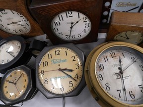 FILE - A selection of vintage clocks are displayed at Electric Time Company, Tuesday, Nov. 1, 2022, in Medfield, Mass. Most of America "springs forward" Sunday, March 10, 2024, for daylight saving time and losing that hour of sleep can do more than leave you tired and cranky the next day. It also could affect your health.