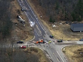 This image from video provided by KMSP-TV shows the scene of a fatal crash, Friday, March 8, 2024 in Dewhurst, Wis. Multiple people were killed in a western Wisconsin traffic crash involving a semitruck and a van, state's governor says. (KMSP-TV via AP)