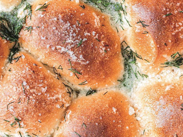  “The garlicky topping is the perfect finishing touch that takes these rolls to the next level,” Murielle Banackissa writes of pampushki, Ukrainian garlic rolls.