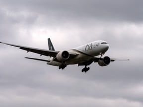 A Pakistan International Airlines flight prepares to land