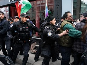 Police clash with pro-Palestinian protesters.