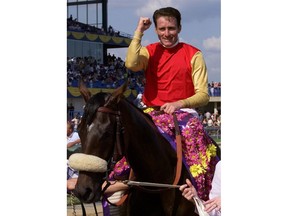 When Gary Boulanger retired in September to end a Hall of Fame career as a champion jockey, he wasn't sure what might lay ahead. But the Alberta native is remaining involved in horse racing as the farm manager for CamHaven Farms. Boulanger celebrates after winning the Queen's Plate with Dancethruthedawn at Woodbine Racetrack in Toronto on Sunday June 24, 2001.