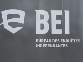 Quebec's police watchdog says it is investigating after two men in their 20s died when the vehicle they were travelling in struck a tree in Montreal's Rosemont--La Petite-Patrie borough Thursday morning. A logo for BEI, Quebec's police watchdog, is seen in Louiseville, Que., Tuesday, March 28, 2023.