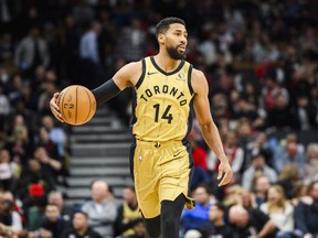 Toronto Raptors forward Garrett Temple (14) dribbles the ball during second half NBA basketball action against the Los Angeles Clippers, in Toronto on Friday, January 26, 2024.