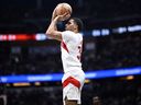 Jontay Porter attempts a thhree-point shot during an NBA basketball game against the Orlando Magic on March 17.