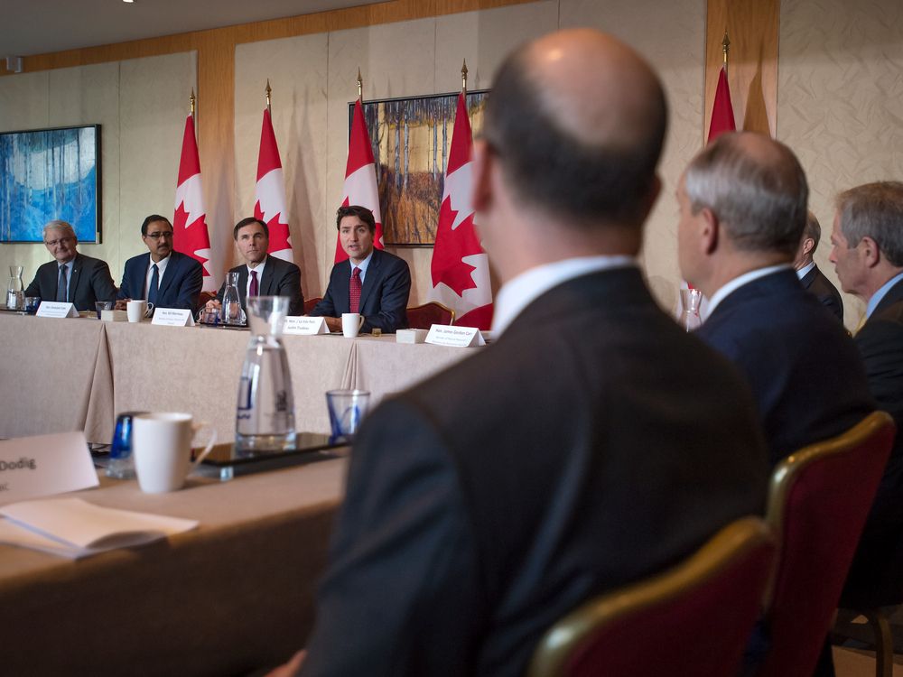 Prime Minister Justin Trudeau takes part in a Long Term Investment Summit infrastructure roundtable with international investors in Toronto, on Nov. 14, 2016. 