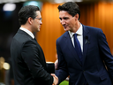 Prime Minister Justin Trudeau and Conservative Leader Pierre Poilievre greet each other as they gather in the House of Commons on Parliament Hill in Ottawa.