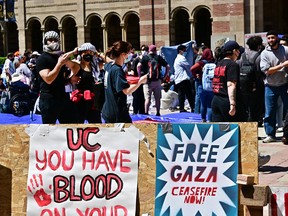 Students protest at an encampment on the campus of the University of California Los Angeles (UCLA), in Los Angeles on April 26, 2024.