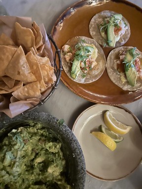 Lobster tacos and freshly made guacamole at La Hacienda.
