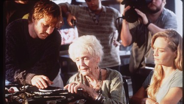From left, Bill Paxton, Gloria Stuart and Susay Amis in a scene from the movie Titanic.