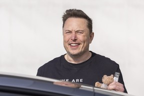 The CEO of Tesla, Elon Musk, gets in a car as he leaves the Tesla Gigafactory on March 13, 2024 near Gruenheide, Germany