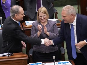 Ontario Finance Minister Peter Bethlenfalvy and Premier Doing Ford.