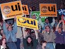 Yes supporters cheer during a speech by Bloc Quebecois Leader Lucien Bouchard at a junior college in Montreal in 1995.