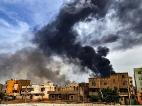 Buildings on fire in Khartoum.