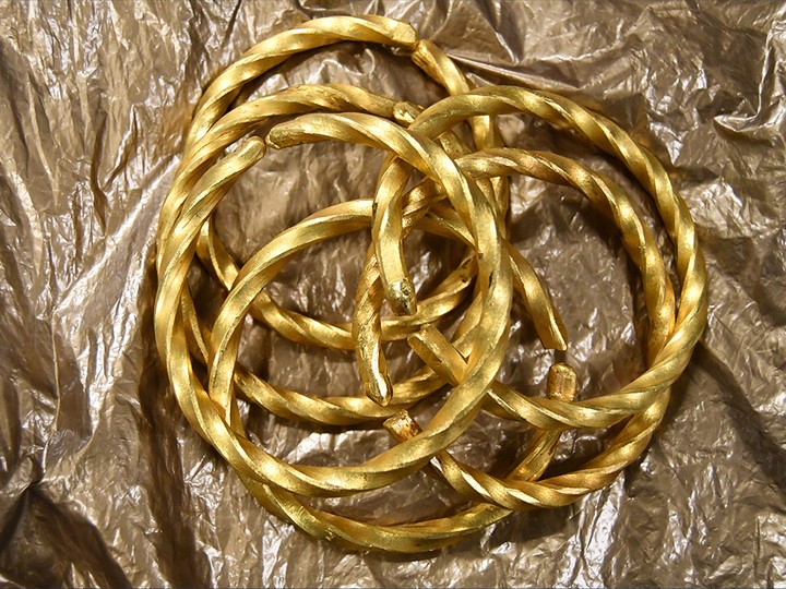  Bracelets seized by police made of gold. Police believe they were forged in the shop basement from the stolen gold.