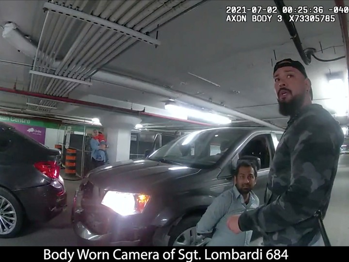  CCTV video of Umar Zameer, his then eight-month pregnant wife Aaida Shaikh and their son (in background) in the Toronto City Hall underground parking lot during Zameer’s 2021 arrest by Toronto police.