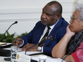 Papua New Guinean Prime Minister James Marape listens during a meeting with Pacific Islands Forum leaders during the U.S.-Pacific Islands Forum Summit in the East Room of the White House, Sept. 2023.
