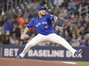 Toronto Blue Jays starting pitcher Yariel Rodriguez throws his first Major League pitch against Colorado Rockies during inning interleague MLB baseball action in Toronto, Saturday, April 13, 2024.