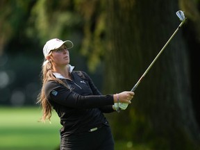 Brooke Rivers, of Canada, watches her second shot from the fairway on the 14th hole during the first round at the LPGA CPKC Canadian Women's Open golf tournament, in Vancouver, B.C., Thursday, Aug. 24, 2023. Rivers, from Brampton, Ont., sank a 12-foot putt on the 18th green to break a tie in her match and lift the Wake Forest Demon Deacons to the ACC conference final on Sunday with a 3-1 win over North Carolina.