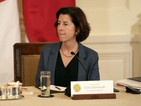 Commerce Secretary Gina Raimondo attends a trilateral meeting with President Joe Biden, Philippine President Ferdinand Marcos Jr., and Japanese Prime Minister Fumio Kishida in the East Room of the White House in Washington, Thursday, April 11, 2024.
