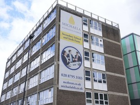 Exterior view of the 'Michaela Community School' in Brent, north west London, England, Tuesday, April 16, 2024. A Muslim student who wanted to pray during lunchtime has lost a court fight against a strict London school that had banned prayer on campus. A High Court judge said Tuesday that the female student had accepted when she enrolled in the school that she would be subject to religious restrictions.
