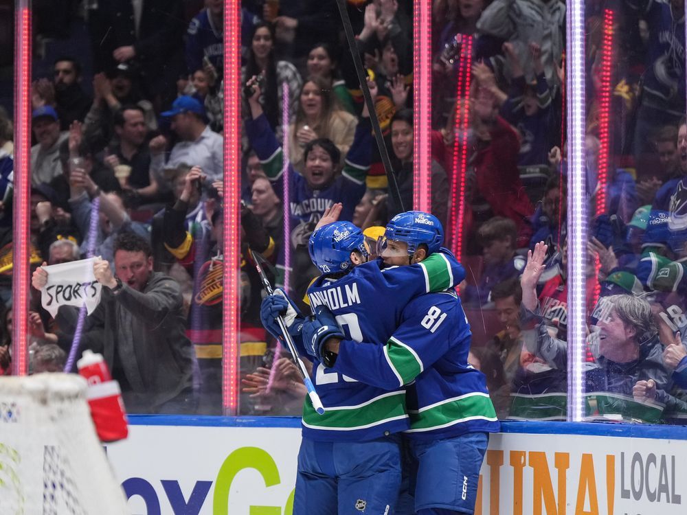 NextImg:Vancouver Canucks clinch Pacific Division title ahead of playoffs