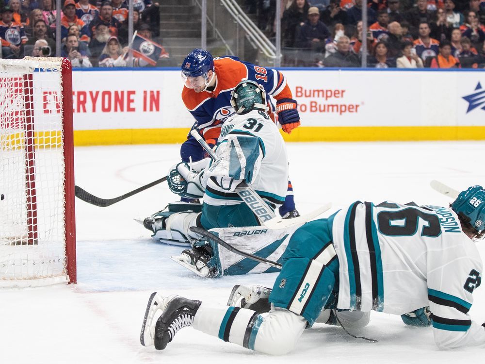 NextImg:Oilers bite Sharks 9-2, McDavid earns 100th assist