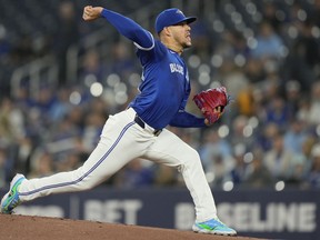 Toronto Blue Jays pitcher José Berríos (17) throws against the Colorado Rockies during first inning MLB baseball action in Toronto on Sunday, April 14, 2024.
