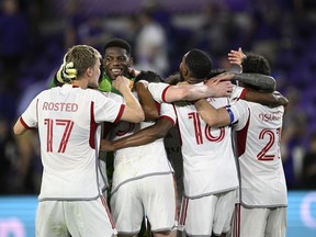 The latest evidence of the turnaround under Herdman came Saturday night when goals by Tyrese Spicer and Prince Owusu lifted Toronto to a dramatic 2-1 comeback win at Orlando City. Toronto FC players celebrate a win against Orlando City in an MLS soccer match Saturday, April 27, 2024, in Orlando, Fla.