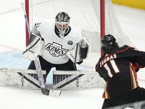 Los Angeles Kings goalie David Rittich will start in net against the Edmonton Oilers in Game 4 of their first-round playoff series Sunday. Rittich, left, deflects a shot by Anaheim Ducks center Trevor Zegras during the first period of an NHL hockey game, in Los Angeles, Saturday, April 13, 2024.