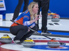 Chelsea Carey wants to be clear, she's not trying to fill Jennifer Jones' curling shoes. Carey directs her sweeper as they play Saskatchewan at the Scotties Tournament of Hearts at Fort William Gardens in Thunder Bay, Ont. on Monday, Jan. 31, 2022.