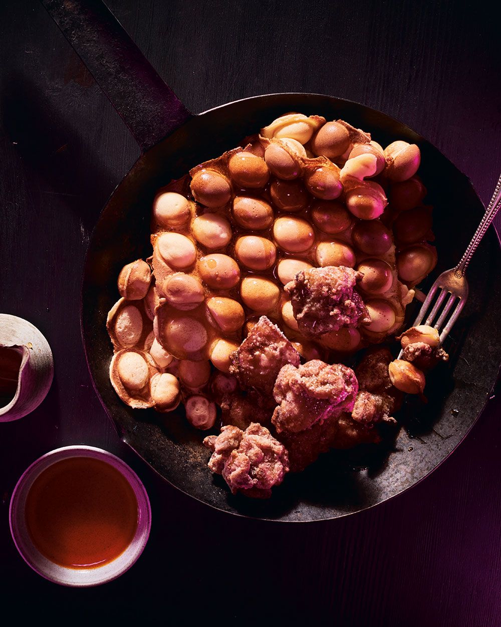  Jon Kung likes to dunk this combination of Hong Kong egg waffles (a.k.a. eggettes) and karaage in warm Szechuan-spiced maple syrup.