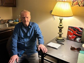 Walter Gillespie poses for a photo in his apartment in Saint John, N.B. on Tuesday, Jan. 9, 2024. Innocence Canada says Walter Gillespie, 80, died Friday morning in his home in Saint John, N.B.