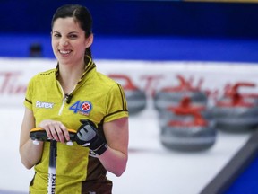 Two-time Olympian Lisa Weagle will return to the four-player game next season as the lead for the Laval, Que.,-based team skipped by Laurie St-Georges. Weagle celebrates a shot as she plays Team Prince Edward Island at the Scotties Tournament of Hearts in Calgary, Alta., Wednesday, Feb. 24, 2021.