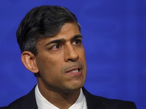 British Prime Minister Rishi Sunak attends a press conference at Downing Street, in London, Monday, April 22, 2024. Sunak pledged Monday that the country's first deportation flights to Rwanda could leave in 10-12 weeks as he promised to end the Parliamentary deadlock over a key policy promise before an election expected later this year.