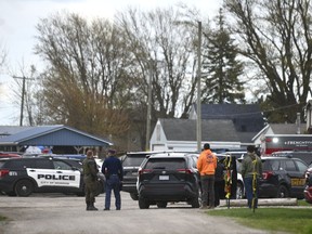 Authorities respond to the Swan Creek Boat Club after a driver crashed a vehicle through a building where a children's birthday party was taking place, Saturday, April 20, 2024, in Berlin Township, Mich.