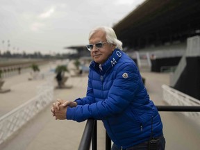 FILE - Trainer Bob Baffert stands for a photo ahead of the Breeders' Cup horse races at Santa Anita in Arcadia, Calif., Oct. 27, 2023. A judge has denied a request by the owner of Baffert-trained Arkansas Derby winner Muth for the colt to run in next month's 150th Kentucky Derby at Churchill Downs. Jefferson County (Ky.) Circuit Judge Mitch Perry declined Thursday, April 18, to grant a temporary injunction to Zedan Racing Stables, which had argued that the ban of Baffert was "illegal."