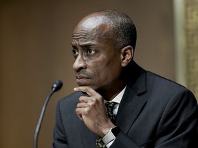 FILE - Philip Jefferson, then-nominee to be a member of the Federal Reserve Board of Governors, listens during a Senate Banking, Housing and Urban Affairs Committee confirmation hearing on Feb. 3, 2022, in Washington.