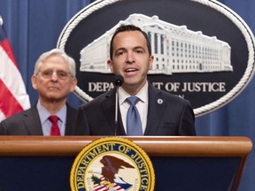 FILE - New Jersey Attorney General Matthew Platkin speaks as Attorney General Merrick Garland listens during a news conference at Department of Justice headquarters in Washington, March 21, 2024. The top prosecutor in a northwestern New Jersey county has resigned amid a state probe into allegations that the office lied about caseloads to pad its budget with state money meant for fraud investigations. James Pfeiffer had been the Warren County prosecutor since 2019. But state Attorney General Matthew Platkin says Pfeiffer resigned Friday, April 5 effective immediately.