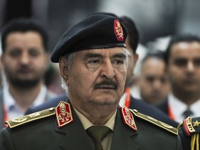 FILE - Libya's Khalifa Hifter, the commander of the self-styled Libyan National Army, is seen at the International Defense Exhibition and Conference in Abu Dhabi, United Arab Emirates, Monday, Feb. 20, 2023. A U.S. judge tossed out a series of civil lawsuits, Friday, April 12, 2024, against Hifter, who used to live in Virginia and was accused of killing innocent civilians in that country's civil war.