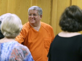 FILE - Bernie Tiede smiles after a court hearing granting his release, May 6, 2014, at the Panola County Courthouse in Carthage, Texas. Advocates for Texas prisoners on Monday, April 22, 2024, asked to join a federal lawsuit filed last year by Tiede, who has alleged his life is in danger because he was being housed in a stifling prison cell without air conditioning. He was later moved to an air-conditioned cell.