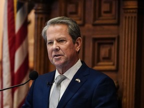 FILE - Georgia Gov. Brian Kemp delivers the State of the State speech, Jan. 11, 2024, in Atlanta. Kemp on Tuesday, April 30, signed a bill into law limiting the ability of some Chinese citizens to buy land in the state.